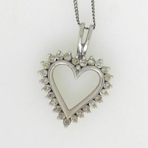 Estate Diamond Pendant/Necklace 
10 Karat White Estate Diamond Pendant 
Gram Weight 2.94 Chain Style: Curb 10 Karat White 18 
25 Center Diamonds Shape: Round