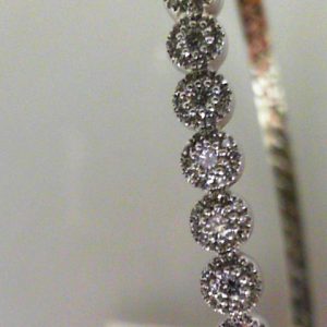 Diamond Bracelets 
14 Karat White Diamond Bracelet 
Gram Weight 10.54 
 Center Diamond Shape: Round 0.98