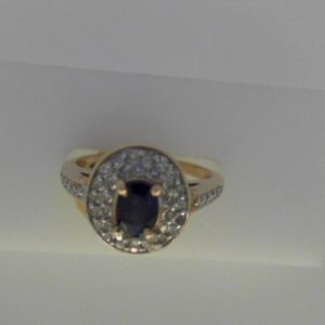 Sapphire Estate Ring
10 Karat Yellow Sapphire Ring With Finger Size 7
Width 1.64mm Gram Weight 3.52
1 Center Sapphire Shape: Oval With 46 Round Diamonds