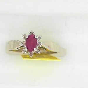 Ruby Estate Ring 
14 Karat White Ruby Ring With Finger Size 6 
Width 1.94mm Gram Weight 2.38 
1 Center Ruby Shape: Oval With 8 Round Diamonds