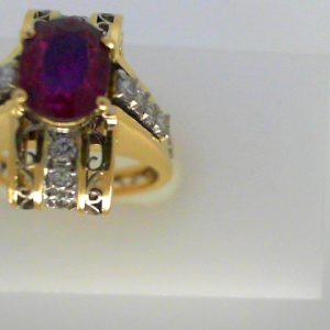 Ruby Estate Ring
18 Karat Yellow Ruby Ring With Finger Size 6.5
Gram Weight 9
1 Center Ruby 1.50ct Shape: Oval With 14 Round Diamonds 0.42 ctw