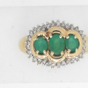Emeralds Estate Ring
14 Karat Yellow Emeralds Ring With Finger Size 8
Gram Weight 4.32
3 Center Emeralds Shape: Oval With 30 Round Diamonds