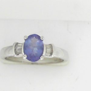 Tanzanite Estate Ring 
14 Karat White Tanzanite Ring With Finger Size 7 
 Gram Weight 2.84 
1 Center Tanzanite Shape: Oval With 4 Baguette Diamonds
