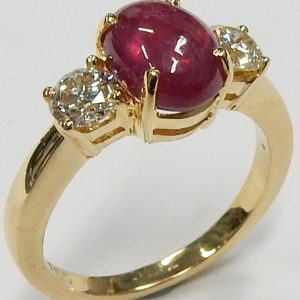 Ruby Estate Ring with appraisal report
18 Karat Yellow Red Ruby Ring With Finger Size 6.75
Gram Weight 5.55
1 Center Ruby 2.75ct Shape: Cabochon; Colour: Red With 2 Round Diamonds 0.66 ctw