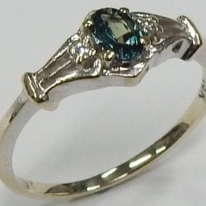 Alexandrite Estate Ring
18 Karat White Alexandrite Ring With Finger Size 5
Gram Weight 1.75
1 Center Alexandrite 0.24ct Shape: Oval With 2 Round Diamonds