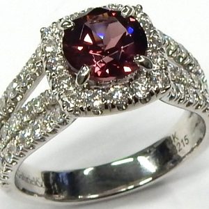 Rhodolite Garnet Estate Ring
14 Karat White Rhodolite Garnet Ring With Finger Size 7.5
Gram Weight 5.9
1 Center Rhodolite Garnet Shape: Round Round Diamond 1.18 ctw