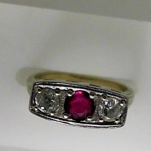Ruby Estate Ring
18 Karat White Ruby Ring With Finger Size 5.75
Gram Weight 4.4
1 Center Ruby 0.39ct Shape: Round With 2 EURO Cut Diamonds 0.50 ctw