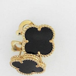 Earrings with Onyxes 
14 Karat Yellow Onyxes Earrings 
 Gram Weight 6.14 
2 Center Onyxes Shape: Various Shapes