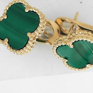 Earrings with Malachites 
14 Karat Yellow Malachites Earrings 
 Gram Weight 6.71 
2 Center Malachites Shape: Various Shapes