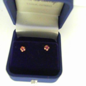 Estate Earrings With Rubies 
14 Karat Yellow Rubies Earrings 
 Length: 17in Gram Weight 0.6 
2 Center Rubies Shape: Round