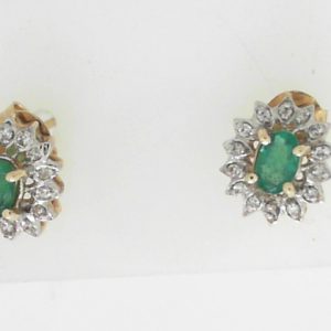Estate Earrings With Emeralds 
14 Karat Yellow Emeralds Earrings 
 Gram Weight 2.4 
2 Center Emeralds Shape: Oval With 28 Round Diamonds