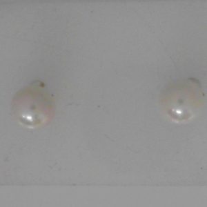 Estate Earrings With Pearls 
14 Karat Yellow Pearls Earrings 
 Gram Weight 0.77 
2 Center Pearls Shape: Round