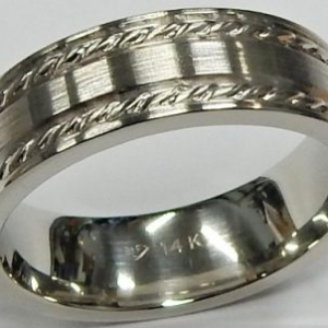 White 10 Karat Satin Band Estate Ring Width 6.7 mm 
Size: 10 
Gram Weight 10.12 gr