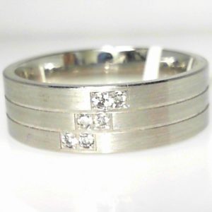 White 10 Karat Satin Band Ring 
Size: 10 
Gram Weight 8.69 gr