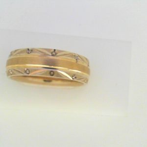 Yellow/White 10 Karat Satin Band Ring 
Size: 10 
Gram Weight 7.96 gr