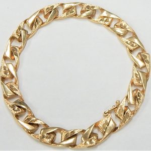 Yellow 10 Karat Engraved Curb Estate Bracelet 
Length 7.5 in 
Gram Weight 21.5 gr