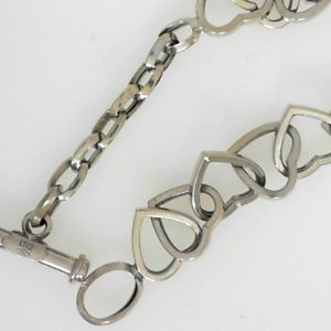 White 18 Karat Polished Fancy Link Estate Bracelet
Length 8 in
Gram Weight 10.5 gr