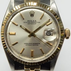 Estate Rolex Dress Year: 1973
Vendor Style #: Rolex Datejust 1601 SN: 3281542 Jubilee
36mm 18K/Stainless Steel
Dial: SIlver hash 
Box Not Included/Papers Not Included
Condition Good
1 Year Warranty