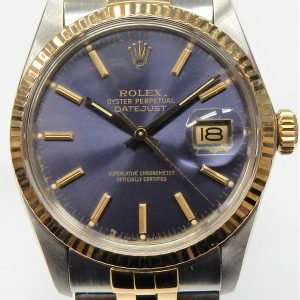 Estate Rolex Dress Year: 1984
Vendor Style #: 16013 Datejust SN: 8386138 Jubilee
36mmmm 18K/Stainless Steel
Dial: Violet/Blue 
Box Included/Papers Not Included
Condition Good
1 Year Warranty