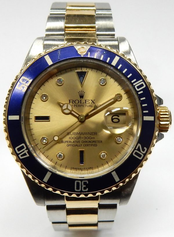 Estate Rolex Divers Year: 1990
Vendor Style #: 16613 Serti Sultan Submariner champagne dial with diamonds and sapphires SN: E404758 Oyster
40mmmm 18K/Stainless Steel
Dial: Champagne diamonds and sapphires
Box Not Included/Papers Not Included
Conditi