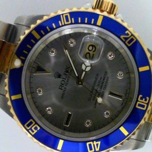 Estate Rolex Divers Year: 2007
Vendor Style #: 16613 Silver Serti dial SN: Z173264 Oyster
40mm 18K/Stainless Steel
Dial: SIlver diamond sapphire 
Box Included/Papers Included
Condition Very Good
1 Year Warranty