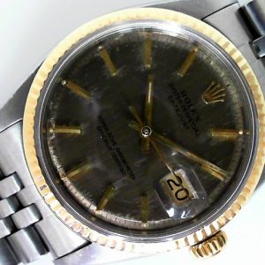 Estate Rolex Dress Year: 1966
Vendor Style #: 1601 Datejust 36 SN: 1429680 Jubilee
36mm StainlessSteel
Dial: Taupe hash 
Box Not Included/Papers Not Included
Condition Fair
1 Year Warranty