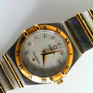 Ladies 18 karat and steel  Omega Constellation Manhattan 1272.75.00 with papers.