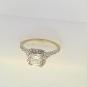 Diamond Engagement Ring 
14 Karat White Engagement Ring 1.04twt
Finger Size 6.5 
1 Center Diamond 0.76ct Shape: Princess Clarity: I2 Colour: J With 40 Round Diamonds 0.28 ctw 1.04