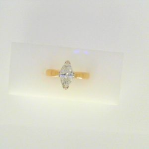 Diamond Engagement Ring 
14 Karat Yellow/White Engagement Ring 1.01twt
Finger Size 6.25 Gram Weight 3.5gram weight Width: 2.2 
1 Center Diamond 1.01ct Shape: Marquise Clarity: VS2 Colour: I 1.01