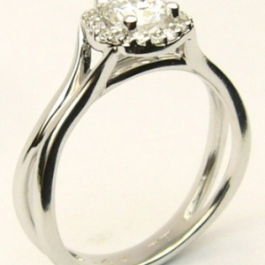 Diamond Engagement Ring 
14 Karat White Engagement Ring 0.58twt
Finger Size 6.75 Gram Weight 3.8gram weight Width: 2.9 
1 Center Diamond 0.50ct Shape: Round Clarity: VVS2 Colour: D With 16 Round Diamonds 0.08 ctw 0.58