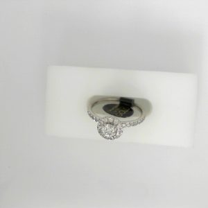 Diamond Engagement Ring 
18 Karat White Engagement Ring 0.77twt
Finger Size 6.5 
1 Center Canadian Diamond 0.31ct Shape: Round Clarity: SI1 Colour: I With 50 Round Diamonds 0.46 ctw 0.77