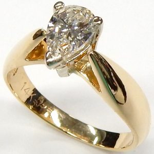 Estate Diamond Engagement Ring 
14 Karat Yellow Estate Engagement Ring 
Finger Size 6.75 Gram Weight 2.8 
1 Center Diamond 0.65ct Shape: Pear; Clarity: SI2; Colour: J/K 0.65