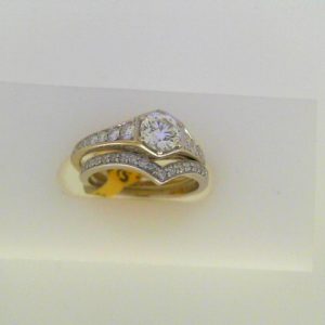 Estate Diamond Engagement Ring 
14 Karat White Estate Engagement Ring Width 2.8mm 
Finger Size 5 Gram Weight 3.47 
1 Center Diamond 0.51ct Shape: Round With 39 Round Diamonds 0.40 ctw 0.91