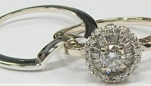 Estate Diamond Engagement Ring 
14 Karat White Estate Engagement Ring 
Finger Size 5 Gram Weight 4.5 
1 Center Diamond 0.20ct Shape: Round With 40 Various Shapes Diamonds 0.20 ctw 0.4