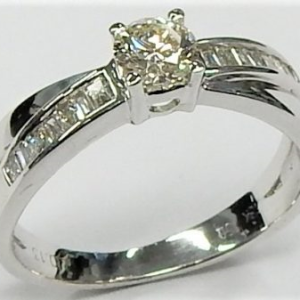 Estate Diamond Engagement Ring 
14 Karat White Estate Engagement Ring 
Finger Size 5.75 Gram Weight 3.4 
 Center Diamond Shape: Various Shapes 0.43