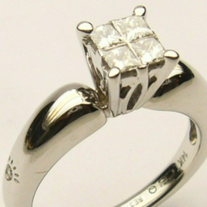 Estate Diamond Engagement Ring 
14 Karat White Estate Engagement Ring Width 2mm 
Finger Size 4.5 Gram Weight 4.1 
4 Center Diamonds Shape: Princess; Clarity: SI1; Colour: H 0.35