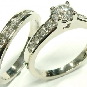 Estate Diamond Engagement Ring 
14 Karat White Estate Engagement Ring 
Finger Size 5.25 Gram Weight 5.5 
22 Center Diamonds Shape: Round; Clarity: SI2; Colour: H/I With 1 Round Diamond 0.38 ctw 0.88