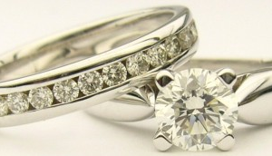 Estate Diamond Engagement Ring 
19 Karat White Estate Engagement Ring 
Finger Size 4.5 Gram Weight 6.6 
1 Center Diamond 0.60ct Shape: Round; Clarity: SI2; Colour: H Round Diamond 0.24 ctw 0.84