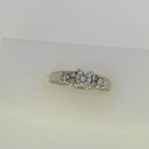 Estate Diamond Engagement Ring 
Platinum White Estate Engagement Ring Width 2.7mm 
Finger Size 4.25 Gram Weight 5.3 
7 Center Diamonds Shape: Round 0.28