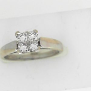 Estate Diamond Engagement Ring 
14 Karat White Estate Engagement Ring Width 1.7mm 
Finger Size 6 Gram Weight 2.7 
4 Center Diamonds Shape: Princess; Clarity: I1; Colour: H/I 0.44