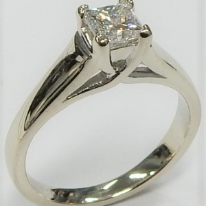 Estate Diamond Engagement Ring 
14 Karat White Estate Engagement Ring 
Finger Size 5.25 Gram Weight 3.7 
1 Center Diamond 0.48ct Shape: Princess; Clarity: I1; Colour: G 0.48