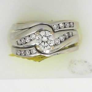 Estate Diamond Engagement Ring 
14 Karat White Estate Engagement Ring 
Finger Size 5.25 Gram Weight 7.7 
1 Center Diamond 0.34ct Shape: Round; Clarity: SI2; Colour: H With 16 Round Diamonds 0.24 ctw 0.58