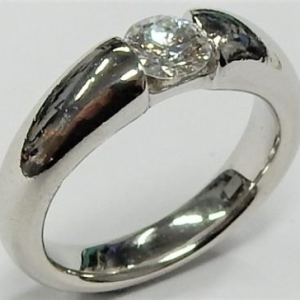 Estate Diamond Engagement Ring 
Platinum White Estate Engagement Ring 
Finger Size 6 Gram Weight 11.6 
1 Center Diamond 0.50ct Shape: Round; Clarity: I1; Colour: I 0.5