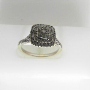 Estate Diamond Engagement Ring 
10 Karat White Estate Engagement Ring 
 Gram Weight 3.1 
 Center Diamond Shape: Round; Clarity: I1; Colour: I 0.5