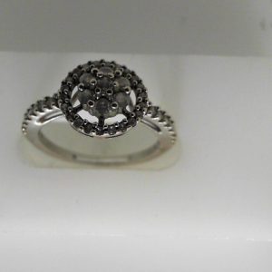 Estate Diamond Engagement Ring 
14 Karat White Estate Engagement Ring 
Finger Size 6 Gram Weight 2.39 
41 Center Diamonds Shape: Round; Clarity: I2; Colour: H/I 0.52