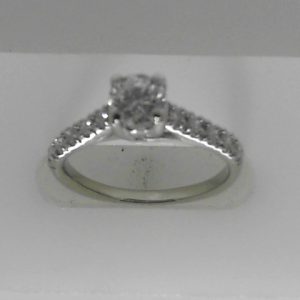 Estate Diamond Engagement Ring 
14 Karat White Estate Engagement Ring 
 Gram Weight 4.8 
1 Center Diamond 0.55ct Shape: Round; Clarity: SI1; Colour: H/I With 10 Round Diamonds 0.20 ctw 0.75