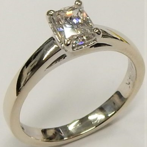 Estate Diamond Engagement Ring 
14 Karat White Estate Engagement Ring 
Finger Size 6.75 Gram Weight 3.53 
1 Center Diamond 0.68ct Shape: Cushion; Clarity: I1; Colour: F 0.68