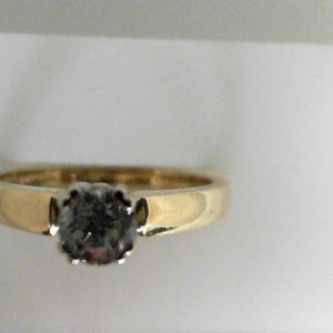 Estate Diamond Engagement Ring 
14 Karat Yellow Estate Engagement Ring 
Finger Size 6.5 Gram Weight 3.1 
1 Center Diamond 0.48ct Shape: Round; Clarity: I1; Colour: G/H 0.48
