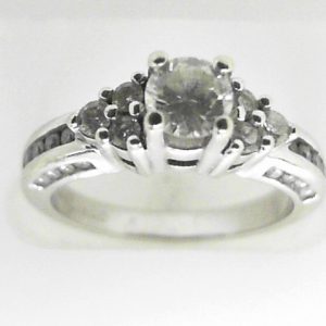 Estate Diamond Engagement Ring 
14 Karat White Estate Engagement Ring 
Finger Size 5.25 Gram Weight 4.2 
1 Center Diamond 0.38ct Shape: Round; Clarity: VVS2; Colour: G With 30 Round Diamonds 0.50 ctw 0.88