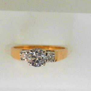 Estate Diamond Engagement Ring 
14 Karat Yellow Estate Engagement Ring 
Finger Size 6 Gram Weight 2.9 
2 Center Diamonds Shape: Round; Clarity: VS; Colour: G/H 0.51